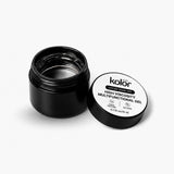 An open black jar of Kolor Enriched Soak Off High Viscosity Multifunctional Gel with its white lid placed beside it on a clean white background.